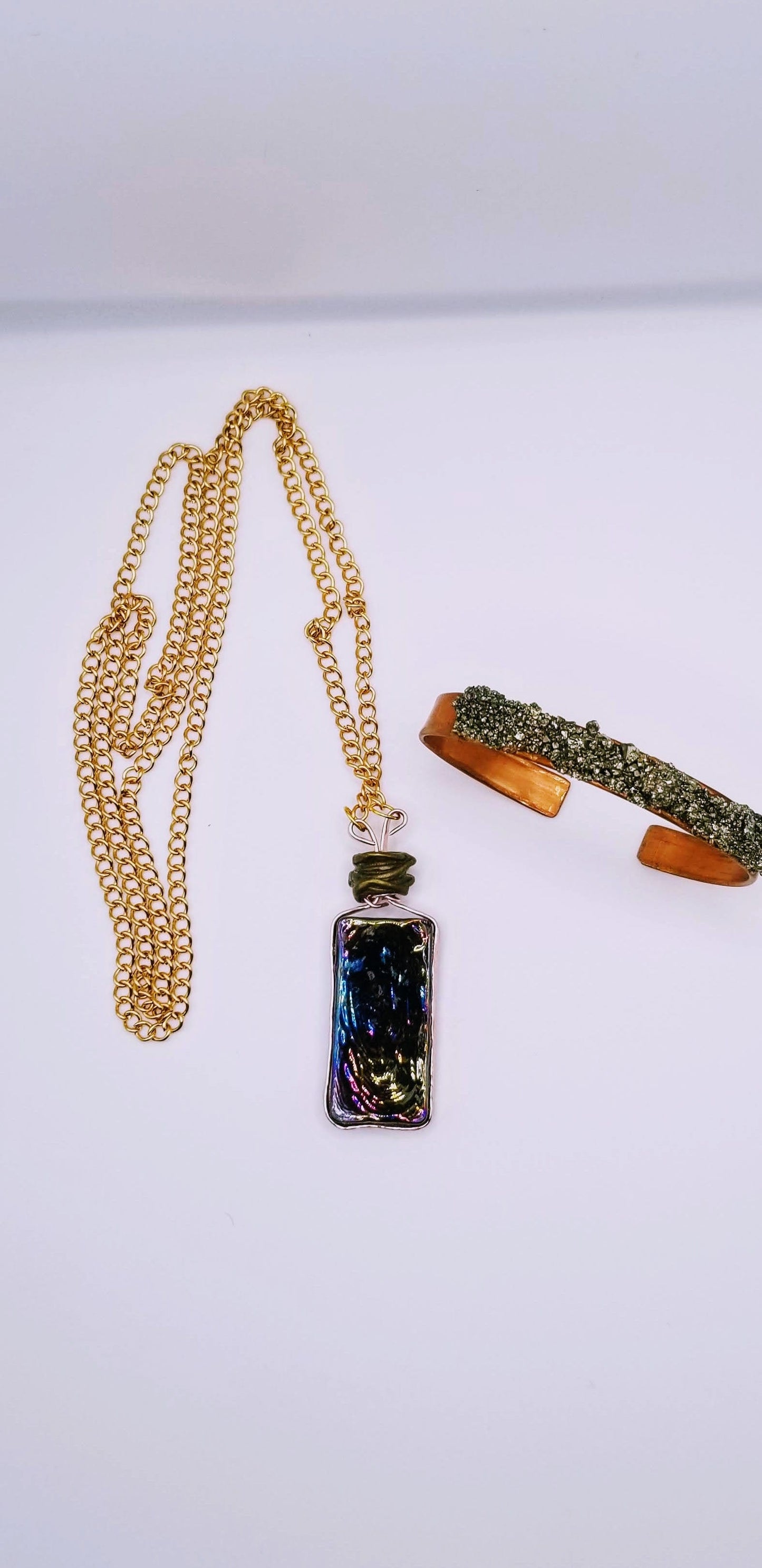 Handcrafted Jewelry By Teri C Necklace set Rainbow Amber necklace with Copper Pyrite cuff bracelet